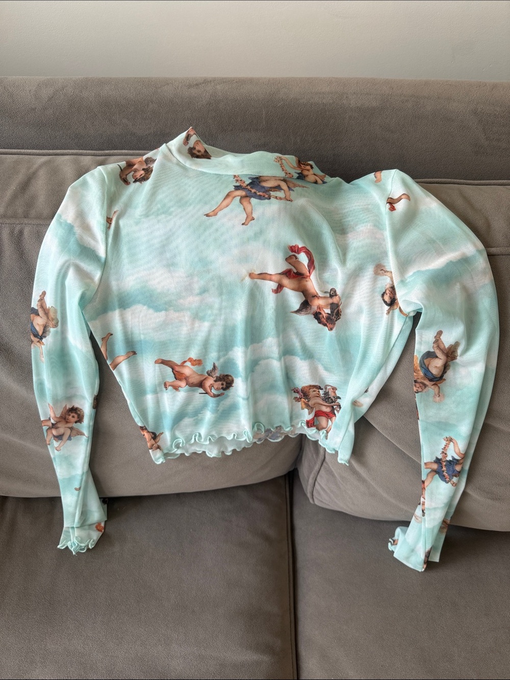 Mint Cherub-Print Long Sleeve Ruffle Hem Top
